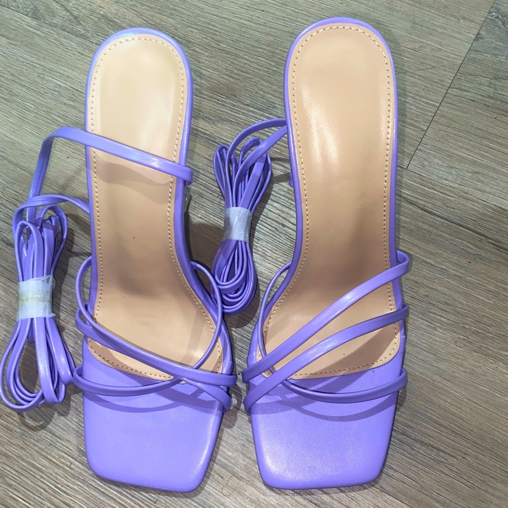Purple heels with a clear bottom (never worn) and they are a size 6.